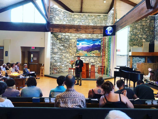 Rev. Scott Hardin-Nieri preaching about creation care at the Unitarian Universalist Congregation of Asheville. [PROVIDED PHOTO]