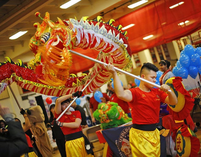The dragon dance to welcome the Lunar New Year, year of the dog.



Chinese Lunar New Year, the year of the dog is celebrated in North Quincy on Sunday, Feb. 11, 2018

Greg Derr/ The Patriot Ledger
