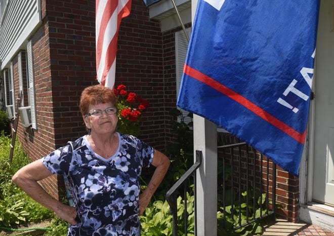 Kay Keenan believes the fact she has been told to take down a Trump 2020 flag by the Rochester Housing Authority violates her First Amendment rights. [Deb Cram/Fosters.com]