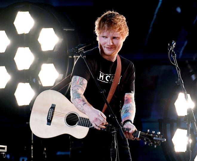 Recording artist Ed Sheeran performs onstage during The 59th GRAMMY Awards at STAPLES Center in 2017 in Los Angeles, California. [KEVORK DJANSEZIAN/GETTY IMAGES/TNS]