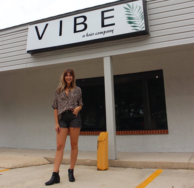 Sam Stark poses in front of her Green Circle eco-friendly salon, Vibe Hair Co., at 2730 S. U.S. 1, Suite M, in St. Augustine. The grand opening was July 5. [Provided by Old City Public Relations]