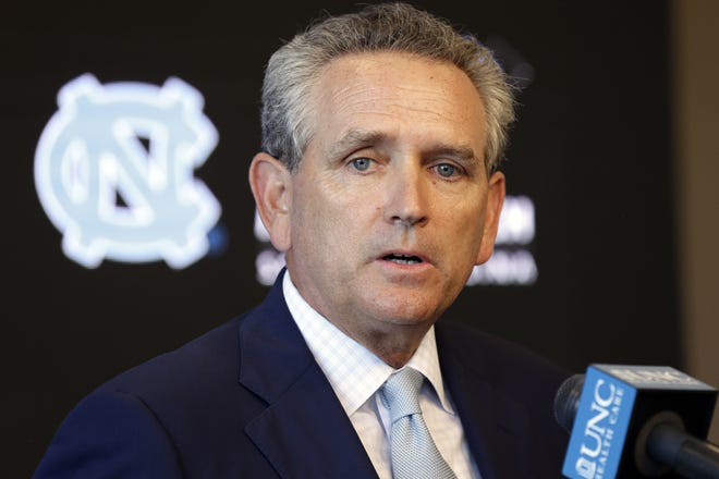 University of North Carolina athletics director Bubba Cunningham makes comments during the football team's media day in Chapel Hill last August. UNC has had enough coaching changes last season to surprise even Cunningham. [AP Photo/Gerry Broome, File]