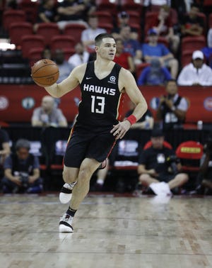 Atlanta Hawks' Matt Mooney plays against the Washington Wizards in an NBA summer league basketball game Thursday at the Thomas and Mack Center in Las Vegas. Mooney scored a team-high 17 points to help the Hawks beat the San Antonio Spurs 80-72 on Friday. [AP Photo/John Locher]