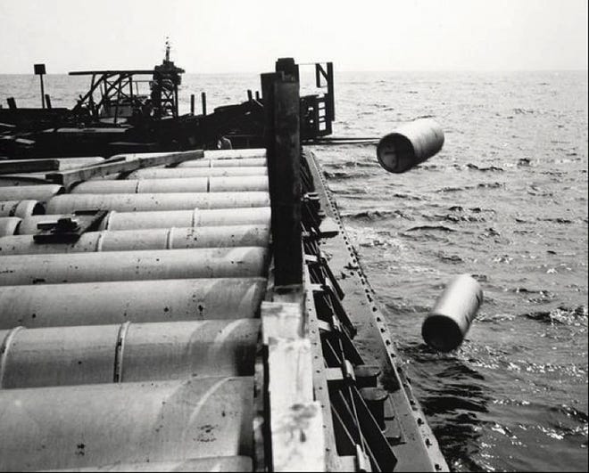 Dumping of munitions like these containers of mustard gas, shown in the Atlantic Ocean in 1964, also occurred in the Gulf of Mexicol. Records of exactly what was dumped and where it was dumped are sketchy and may, in many cases, be inaccurate. [U.S. ARMY PHOTO]