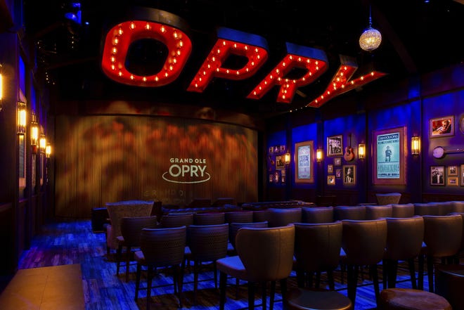 In the Circle Room, seen June 13, 2019, a new immersive film explains the history of the Grand Ole Opry while showing video clips of more than 100 different artists on stage. The 14-minute film is hosted by Garth Brooks and Trisha Yearwood. [Grand Ole Opry via AP]