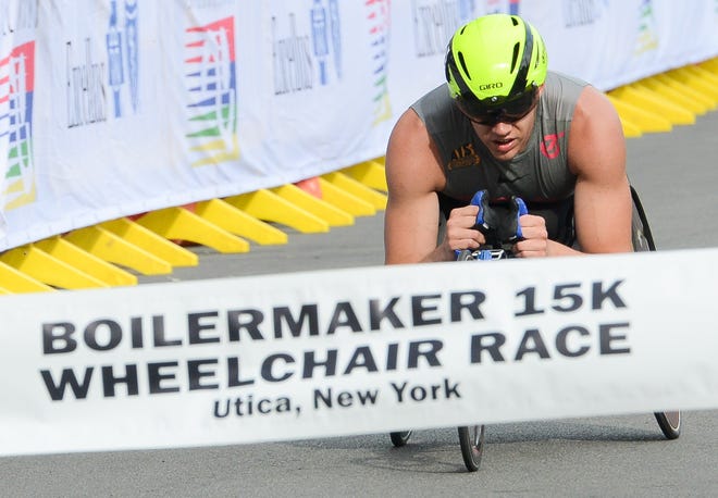 Daniel Romanchuk takes first place in the 15K wheelchair race at the 42nd annual Boilermaker Road Race Sunday, July 14, 2019 on Court Street in Utica. He won the Boilermaker for the fourth consecutive year. [ALEX COOPER / OBSERVER-DISPATCH]