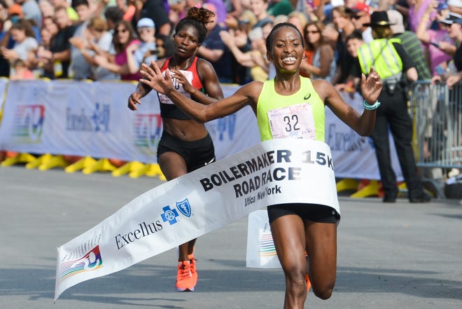 Caroline Rotich wins the women's 15K race at the 42nd annual Boilermaker Road Race Sunday, July 14, 2019 on Court Street in Utica. [ALEX COOPER / OBSERVER-DISPATCH]