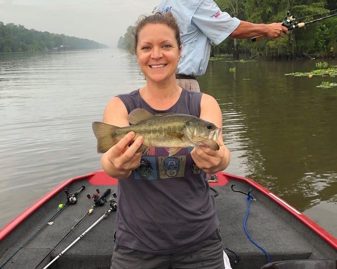 Kaycee used a 6" Zoom finesse worm to trick her biggest bass of the day, caught in the lily pads.