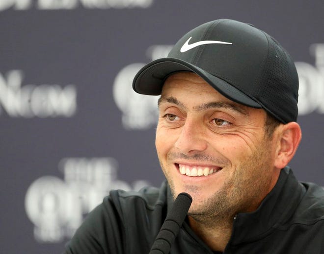 British Open 2018 winner Francesco Molinari of Italy talks to the media during a press conference at Royal Portrush Golf Club, Northern Ireland, Monday, July 15, 2019. The148th Open Golf Championship begins on July 18. (AP Photo/Peter Morrison)