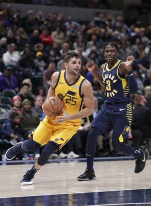 Point guard Raul Neto drives to the basket with the Utah Jazz. [ASSOCIATED PRESS FILE]