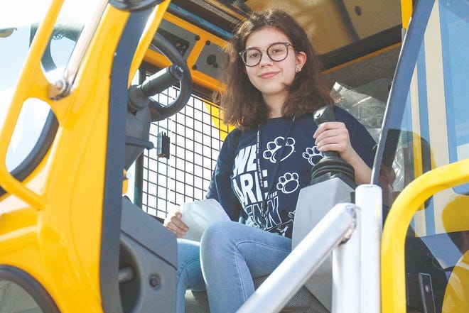 Allie Welsh, a homeschool student from Greencastle, sat in the cab of a Manitowoc crane last week while on a field trip with Penn State Mont Alto’s STEM camp. JOHN IRWIN/ECHO PILOT