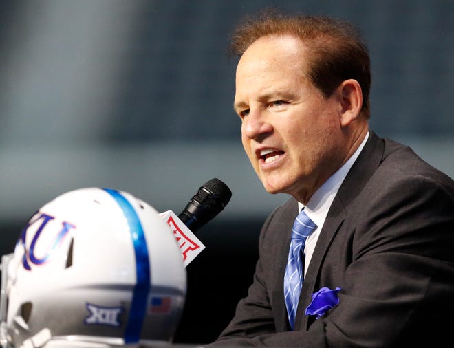 Kansas footbal coach Les Miles speaks on the first day of Big 12 Conference media days Monday at AT&T Stadium in Arlington, Texas. This is Miles' first season at Kansas. [AP Photo/David Kent]