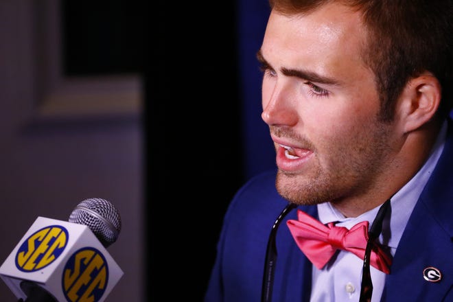 Georgia quarterback Jake Fromm speaks to reporters during the NCAA college football Southeastern Conference Media Days, Tuesday, July 16, 2019, in Hoover, Ala. (AP Photo/Butch Dill)