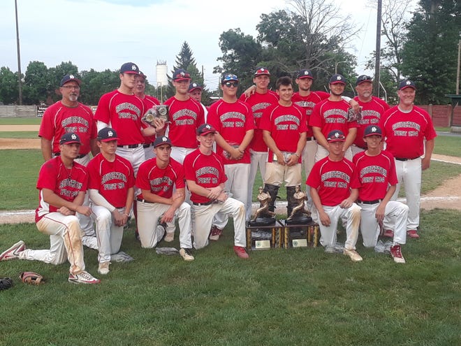 Souderton poses with the Bux-Mont Legion trophy after Tuesday night's clinching win over Quakertown. [DREW MARKOL / STAFF]