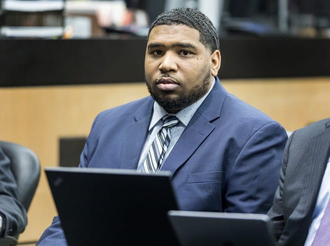 Shamar Lawrence sits in court waiting for the start of jury selection in his trial Tuesday in West Palm Beach July 9, 2019. He is charged with first degree murder in the shooting death of Branden Jackson, 17, of Palm Beach Gardens, who was killed in 2016 as a graduation party in Loxahatchee was breaking up. [LANNIS WATERS/palmbeachpost.com]