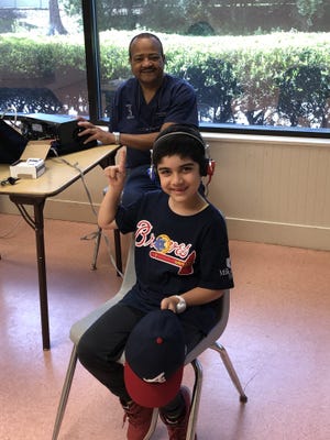 Hearing screening at Miracle League of Manasota. [SUBMITTED PHOTO]
