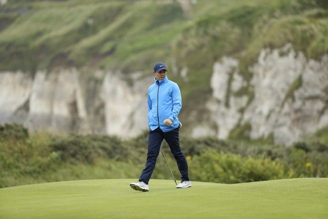 Northern Ireland's Rory McIlroy walks across the fifth green during a practice round Wednesday ahead of the start of the British Open at Royal Portrush in Northern Ireland. The British Open starts Thursday. [PETER MORRISON/THE ASSOCIATED PRESS]