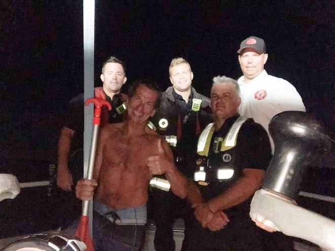 Members of the Venice Fire Department rescued Jay Connelly, front row left, early July 18, 2019, after his boat capsized miles offshore of Longboat and Siesta keys. Back row, right to left: Lt. Derek Lowery, Colton Schuchert and Eric Putnal. Front row, right: Jeremmy Dowd. [PROVIDED BY CITY OF VENICE]