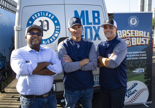 Executive director Johnell Bell (left), Mike Barrett (center) and Craig Cheek, founder and president of the Portland Diamond Project, are on a tour trying to bring Major League baseball to Portland. They stopped in Eugene on Thursday. [Chris Pietsch/The Register-Guard]