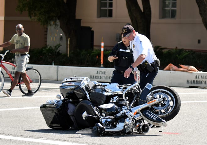 The scene of a crash involving a Sarasota Police Department motorcycle at U.S. 301 and Ringling Boulevard on July 19, 2019. [HERALD-TRIBUNE STAFF PHOTO / CARLOS R. MUNOZ]