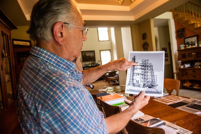 Retired engineer and physicist Louis Cariola Jr., in his New Paltz home, points to a spot on Apollo 11 where he was asked to inspect the radar antenna on the lunar lander in June 1969. Cariola, who was working for Grumman Aerospace, concluded the part would hold up. [PHOTOS BY KELLY MARSH/FOR THE TIMES HERALD-RECORD]