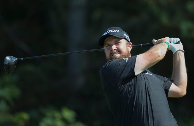 Ireland's Shane Lowry tees off on the 5th hole during the third round of the British Open Golf Championships at Royal Portrush in Northern Ireland, Saturday, July 20, 2019.(AP Photo/Peter Morrison)