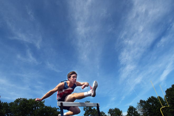 Colin Monsen, 15, of York, Maine, is headed to the National Junior Olympic Track and Field Championships in California next week competing in the decathlon. He works out every day at the York High School track. [Deb Cram/Seacoastonline]