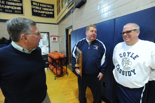 Coyle-Cassidy Athletic Director Tom Pileski, left, talks with Warriors girls head coach MIke O'Brien and former AD Bill Tanter prior to the 2018 Division IV state final game in Springfield.

[Taunton Gazette file photo]