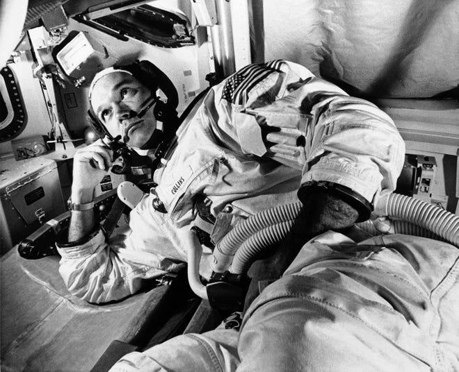 The Apollo 11 command module pilot astronaut Michael Collins, takes it easy during a break in the training for the July moon landing journey in Cape Kennedy, Florida, June 19, 1969. Astronauts Neil A. Armstrong and Edwin E. Aldrin Jr., will take a walk on the lunar surface and Collins will circle alone in moon orbit. (AP Photo)
