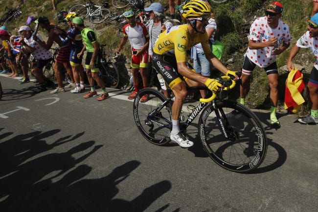 Julian Alaphilippe climbs the Tourmalet pass during Stage 14 of the Tour de France on Saturday. [AP Photo/ Christophe Ena]