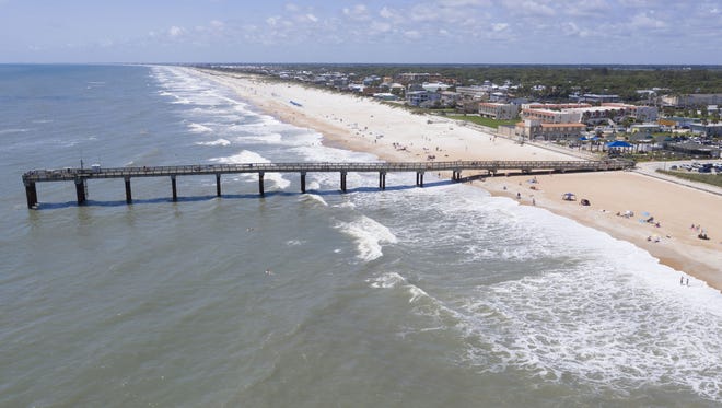 An aerial photograph shows the St. Johns County Ocean and Fishing Pier in St. Augustine Beach in June. [CONTRIBUTED]