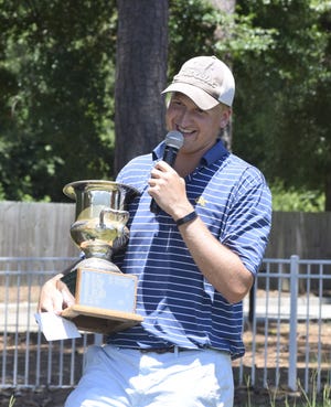 Gus Beisel, who is from Savannah, gives a speech after winning the Augusta City Amateur at Forest Hills Golf Club on Sunday. He finished at even-par over 54 holes, highlighted by an opening-round 65. [WILL CHENEY/THE AUGUSTA CHRONICLE]