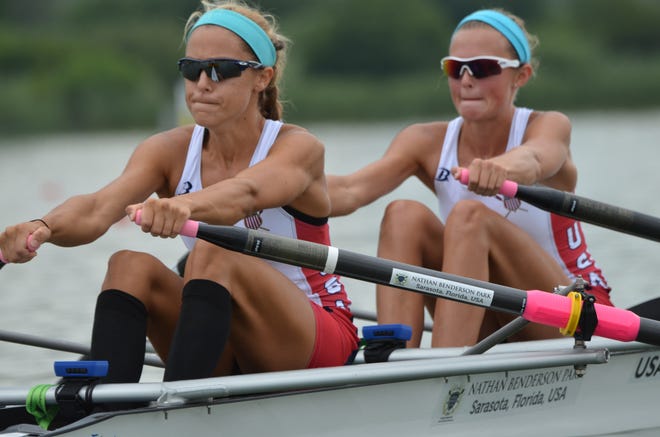 Shawna Sims, 18, and Devin Norder, 17, compete in a qualifying heat of the lightweight doubles sculling event in the Under 23 World Rowing Championships in 2014. Nathan Benderson Park will host this year's Under 23 championships. [Allison Frederick / USRowing]