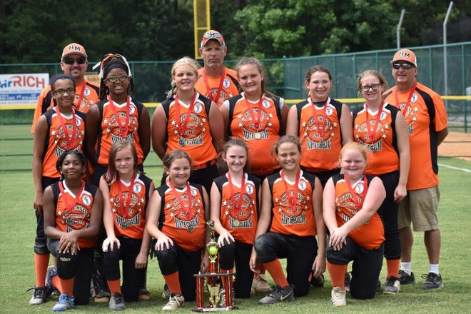Members of the Hope Mills 12U All-Stars are: front row (left to right), Saniyah Leach, Alexis Walters, Annie Ratliff, Ruby Minshew, Madalyn Clark, Kayleigh Brewington; second row (left to right), Jamya Harris, Jordynn Parnell, Hannah Welsh, Paige Ford, Kaylie Cook, Carly Bailey; back row (coaches left to right), Tadd Minshew, Steven Welsh, Chris Bailey. [Contributed photo]