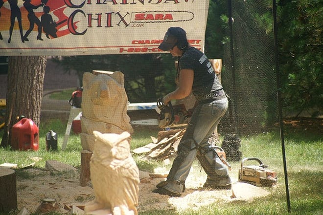 The Chainsaw Chix, apopular chainsaw carving artist, will be one of the many vendors performing demonstrations at the 15th annual Festival of Wood at Grey Towers in Milford, Pa. [Photo provided]