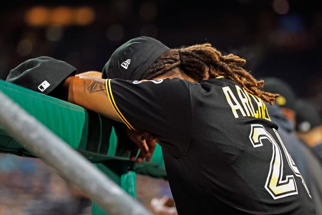 Pittsburgh Pirates starting pitcher Chris Archer collects himself in the dugout after finishing the sixth inning of a baseball game against the St. Louis Cardinals in Pittsburgh, Tuesday, July 23, 2019. Archer did not return to the game and did not figure in the decision. (AP Photo/Gene J. Puskar)