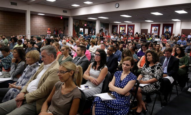 A packed house at the Council on Elementary and Secondary Education meeting at URI's PAFF Auditorium. [The Providence Journal / Kris Craig]
