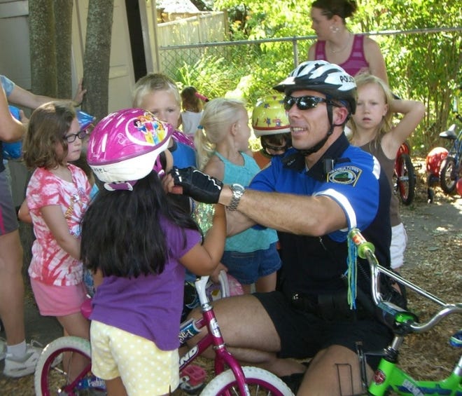Georgetown Police Sgt. Derek Jones will host a bicycle safety program on Aug. 3 at Georgetown Middle High School. Shown here, Jones teaches a similar program in 2010. [File Photo]