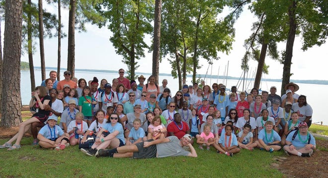 Augusta Sailing Club members host counselors and campers from Camp IVEY, an adaptive summer camp offered by the Family YMCA of Greater Augusta, for a boating activity for children with special needs. [SPECIAL]