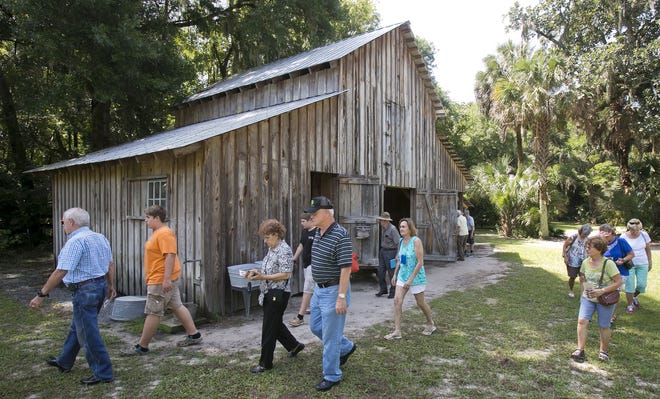 Guides dressed in period clothing take visitors through the rooms and around the grounds of the the Marjorie Kinnan Rawlings Historic State Park in Cross Creek, about 20 miles southeast of Gainesville. The Pulitzer Prize-winning Florida author immortalized the area in many of her nine books. [GateHouse Media Archives/Doug Engle]