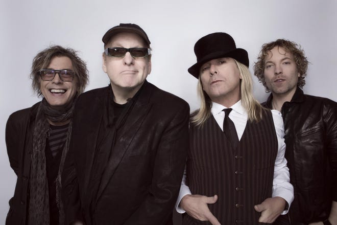 Cheap Trick is, from left to right, Tom Petersson, Rick Nielsen, Robin Zander and Daxx Nielsen. Photo by David McClister.