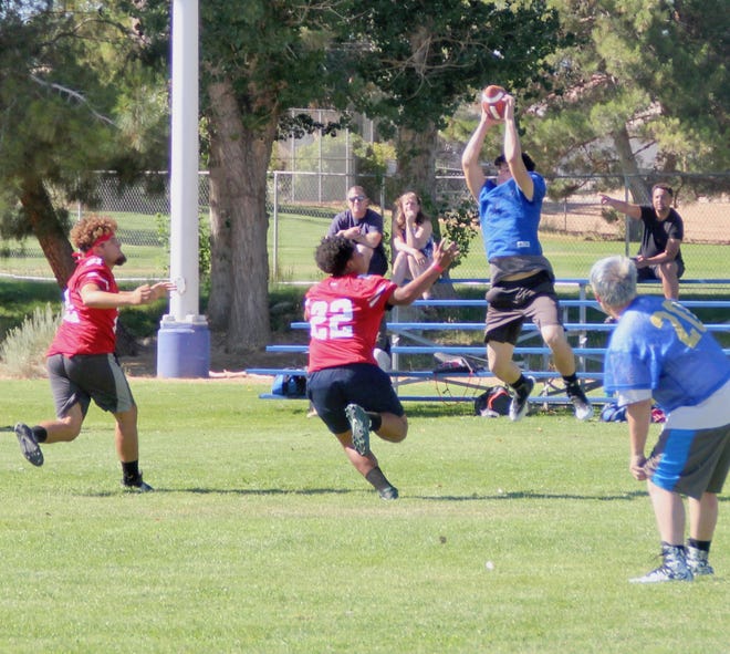 A Lucerne Valley High football player makes a leaping catch at last week's Hesperia Christian Passing Tournament. [Courtesy of Peter Day]