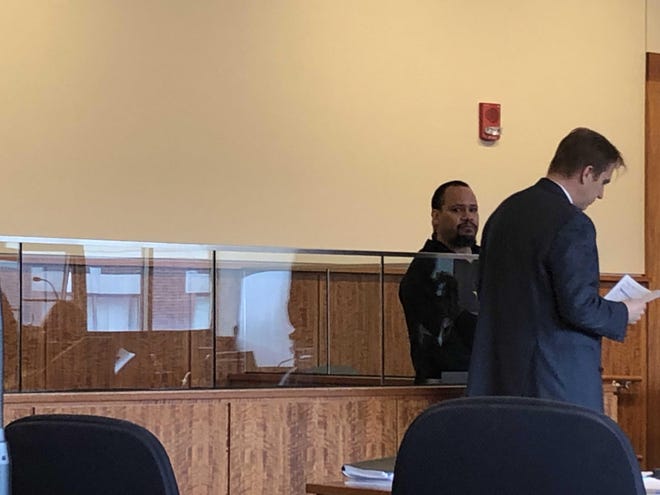 Stephen Nazario appears in District Court in April with defense attorney James Hanley. [Herald News File Photo | Amanda Burke]