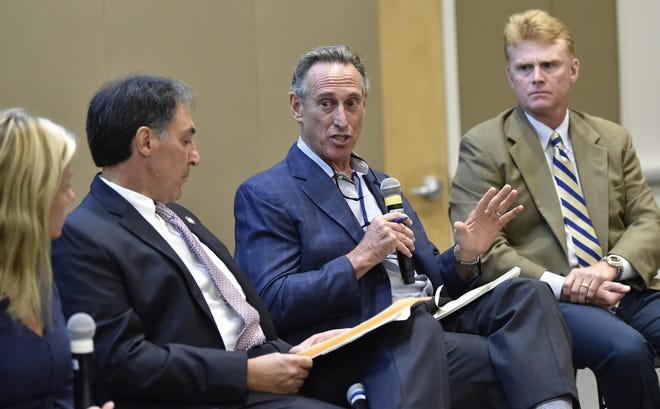 Public Defender Larry Eger (center) recently participated in a Herald Tribune Hot Topics Forum with (from left) Judge Erika Quartermaine, State Attorney Ed Brodsky and County Commission Charles Hines, in which all agreed building a new jail was not the best way to address overcrowding at the current jail and recidivism rates. [Herald-Tribune archive / Thomas Bender]