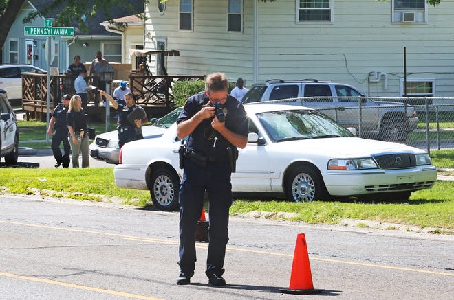 Police investigate a shooting near S.E. 37th and Pennsylvania Thursday afternoon that killed a Topeka teenager. [Thad Allton/The Capital-Journal]