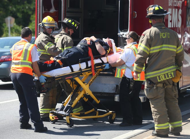Sgt. Chris Edmundson was taken by Bay County EMS to a local hospital after a rear-end collision in October 2014 near Frankford Avenue and 15th Street. Panama City recently decided to suspend its fire department’s first responder EMS services. As such, the department won’t respond to certain medical calls. However, the county will continue to provide ambulance transports. [NEWS HERALD FILE PHOTO]