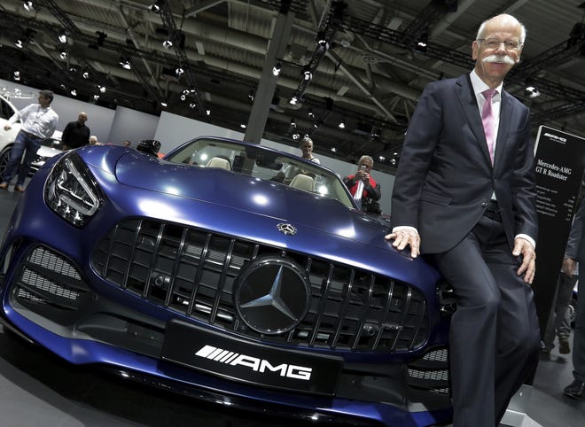 Daimler CEO Dieter Zetsche poses prior to the annual shareholder meeting of the car manufacturer Daimler in Berlin, Germany, on May 22, 2019. (AP Photo/Michael Sohn, file)