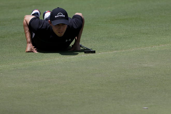 Matthew Fitzpatrick, of England, views his putt on the seventh green during the second round of the World Golf Championships-FedEx St. Jude Invitational Friday, July 26, 2019, in Memphis, Tenn. (AP Photo/Mark Humphrey)