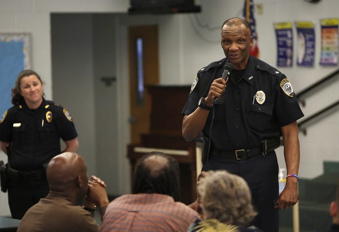Chief Tony Jones, with the Gainesville Police Department, answers questions from a group of citizens about issues in the Duval neighborhood during a community meeting held at the Duval Early Learning Academy, in Gainesville March 20, 2019. GPD is still experiencing an officer shortage while the Alachua County Sheriff's Office is not. [Brad McClenny/The Gainesville Sun]