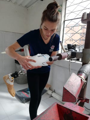 Livi Kozick of Kittery sands a socket for a prosthesis during a trip to Ecuador with the Range of Motion Project, a non profit based in Colorado. Courtesy photo.